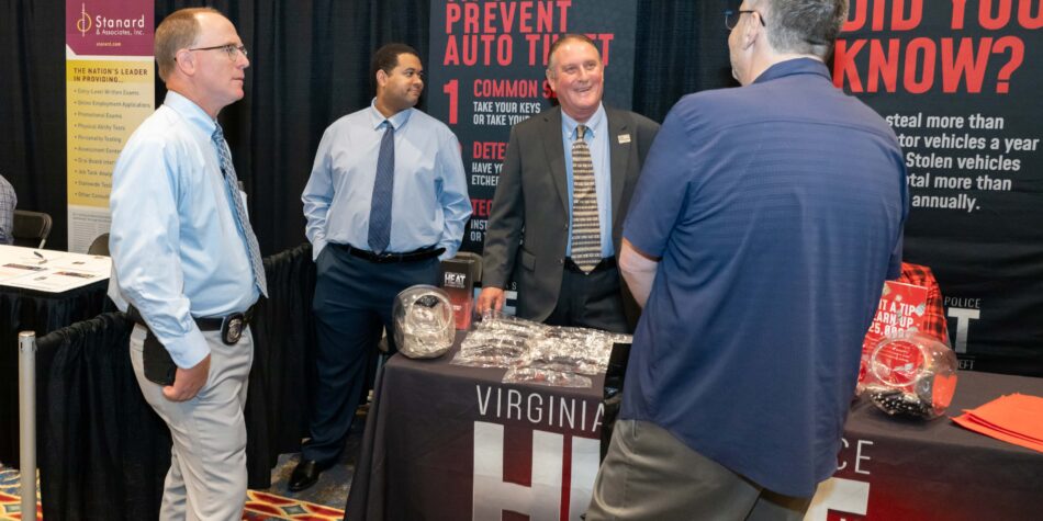 Colleagues talking at the 2026 HEAT Awards