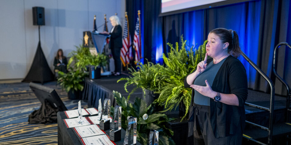 Sign language interpreter translating the 2026 HEAT Awards